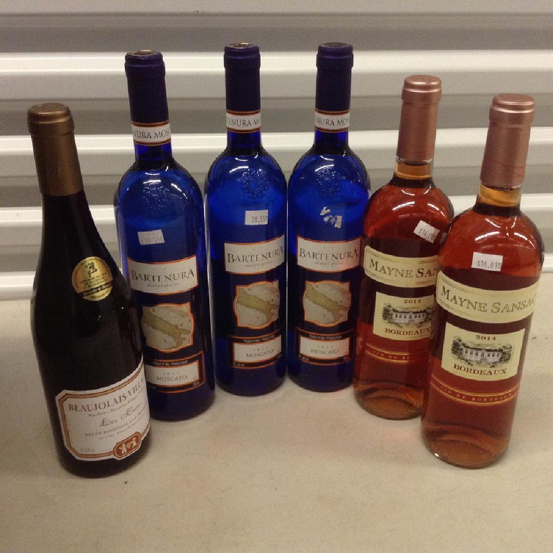 lot of 6 wine bottles: Any contents in bottle is Free; You are bidding on the bottle & unbroken tax stamp