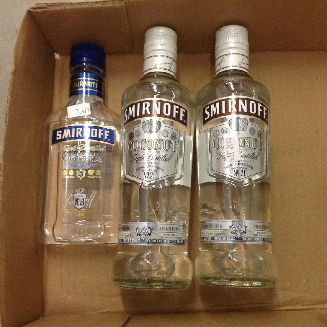 Lot of Smirnoff Coconut Vodka and other: Any contents in bottle is Free; You are bidding on the bottle & unbroken tax stamp