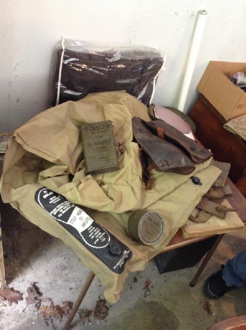 table lot of military items; blanket blow-up bed & (1 of 1)