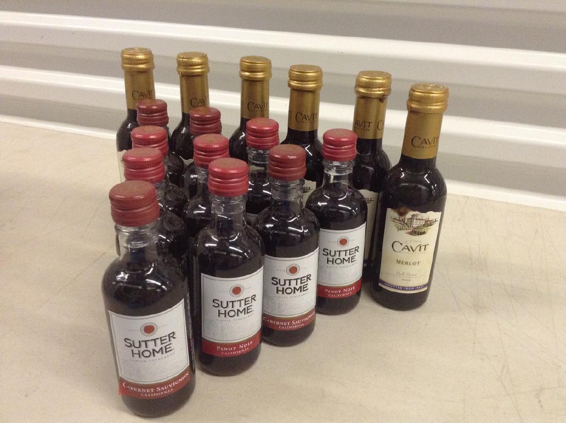 Lot of Mixed wine bottles: Any contents in bottle is Free; You are bidding on the bottle & unbroken tax stamp