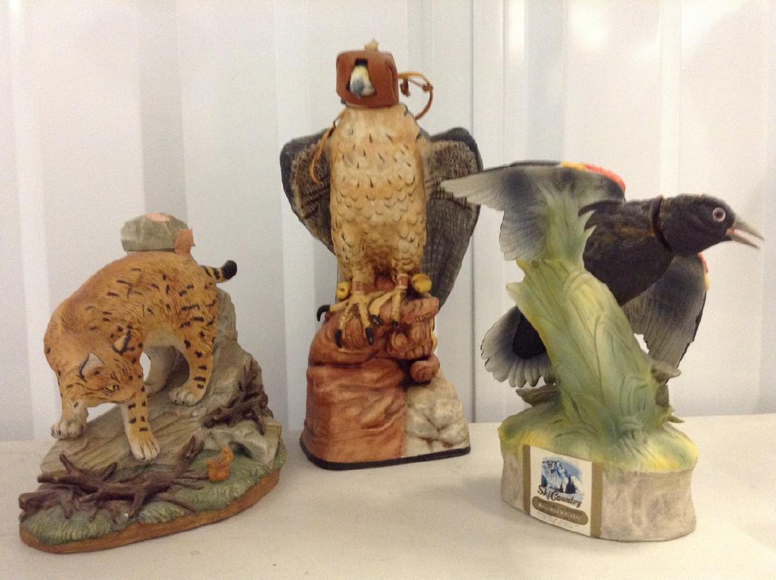 Ski Country Alcohol bottles whiskey animals: Any contents in bottle is Free; You are bidding on the bottle & unbroken tax stamp