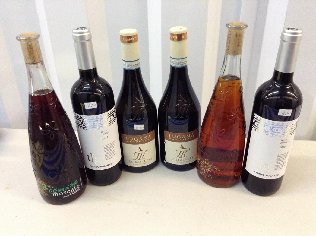 lot of 6 mixed wine bottles: Any contents in bottle is Free; You are bidding on the bottle & unbroken tax stamp