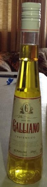 1896 GALLIANO L: Any contents in bottle is Free; You are bidding on the bottle & unbroken tax stamp