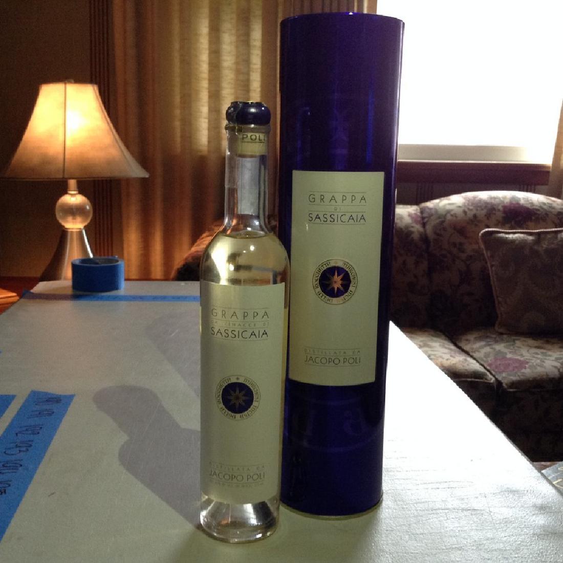 Grappa Sassicaia bottle: Any contents in bottle is Free; You are bidding on the bottle & unbroken tax stamp