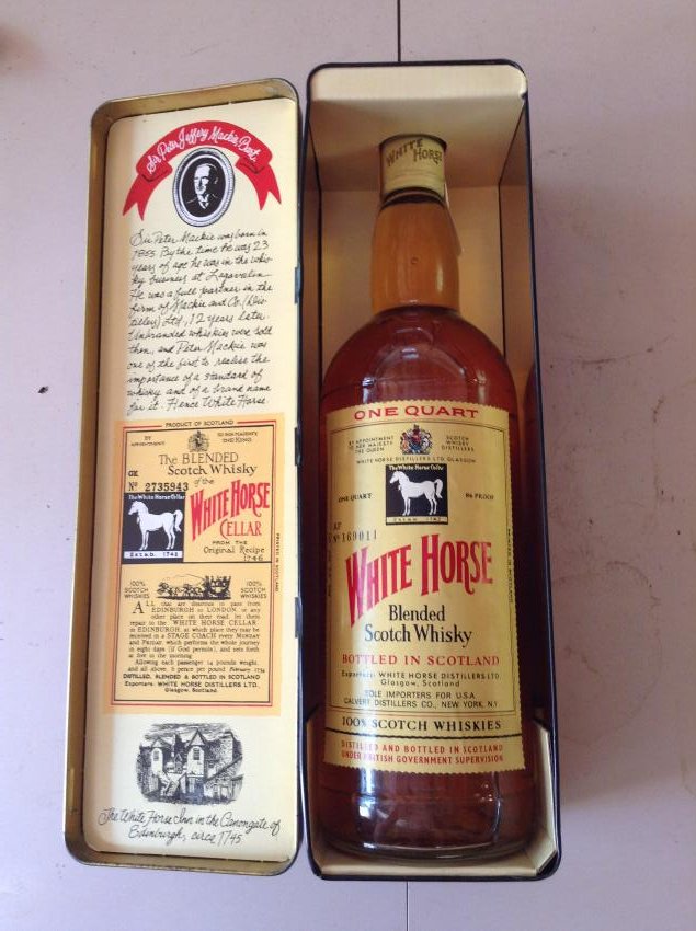 The White Horse the original white horse cellar VINTAGE: Any contents in bottle is Free; You are bidding on the bottle & unbroken tax stamp