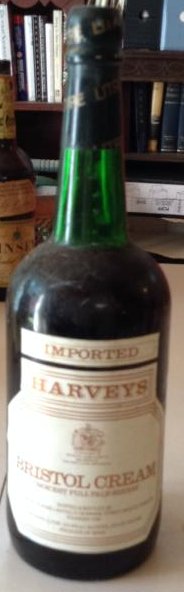 Harvey's Bristol Cream: Any contents in bottle is Free; You are bidding on the bottle & unbroken tax stamp