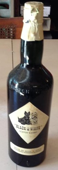 "Black & White" Scotch Whiskey: Any contents in bottle is Free; You are bidding on the bottle & unbroken tax stamp