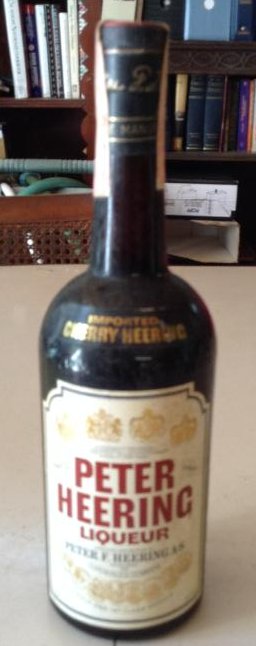 Peter Herring Liqueur: Any contents in bottle is Free; You are bidding on the bottle & unbroken tax stamp