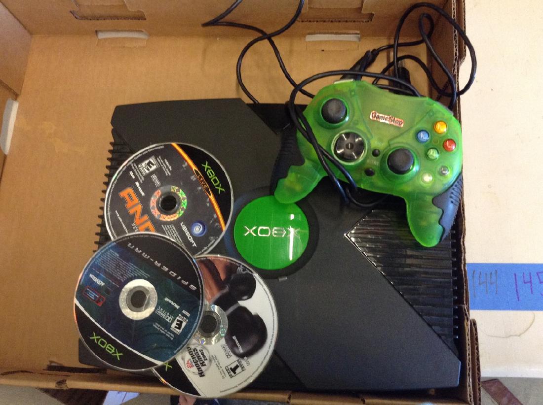 Xbox game console remote control and three games (1 of 1)