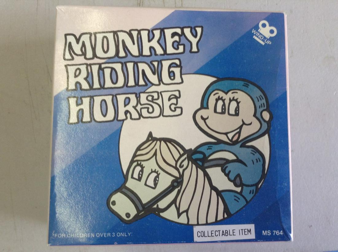 Wind-up Monkey Riding Horse Tin Toy in box: Wind-up Monkey Riding Horse Tin Toy in box