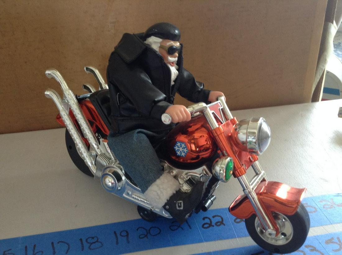 singing battery operated Harley Davidson guy on: singing battery operated Harley Davidson guy on motorcycle