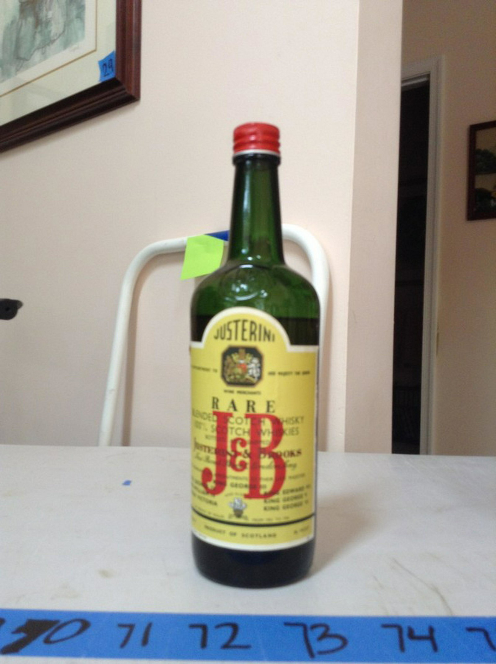 vintage 1920's Justerini and Brooks Blended Scotch: Any contents in bottle is Free; You are bidding on the bottle & unbroken tax stamp