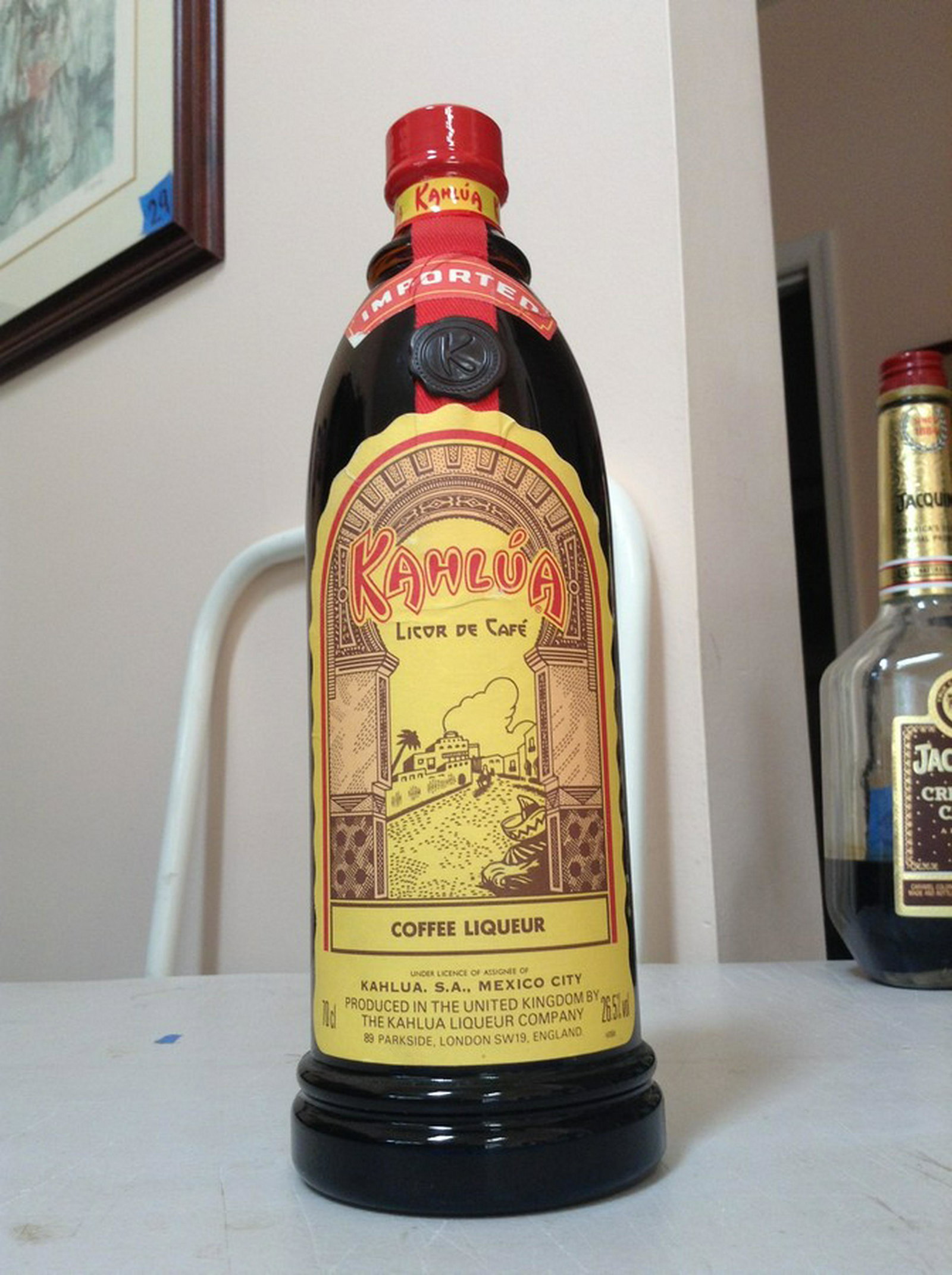 Imported Kahlua Coffee Liqueur: Any contents in bottle is Free; You are bidding on the bottle & unbroken tax stamp