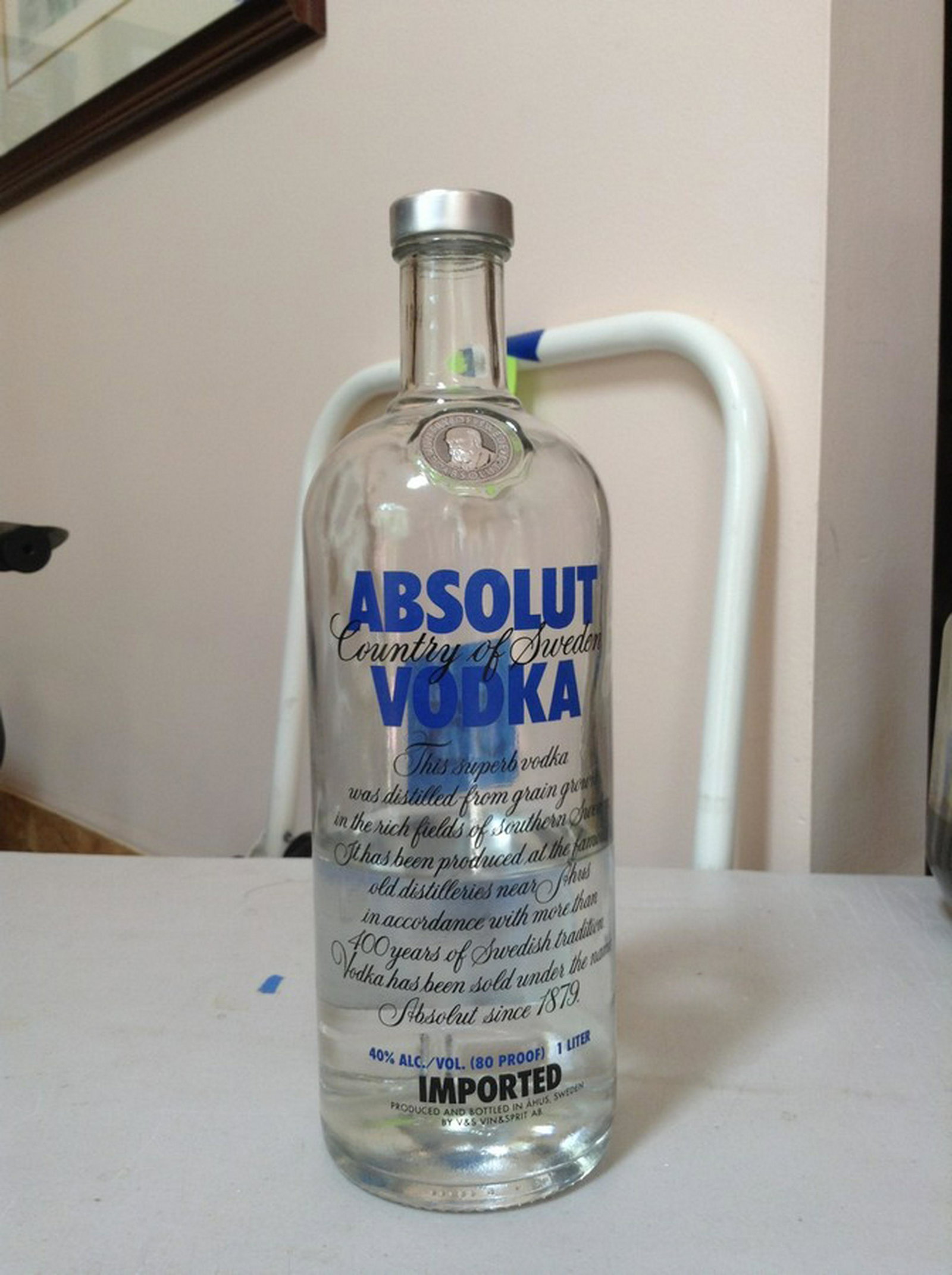 Absolut Vodka imported: Any contents in bottle is Free; You are bidding on the bottle & unbroken tax stamp
