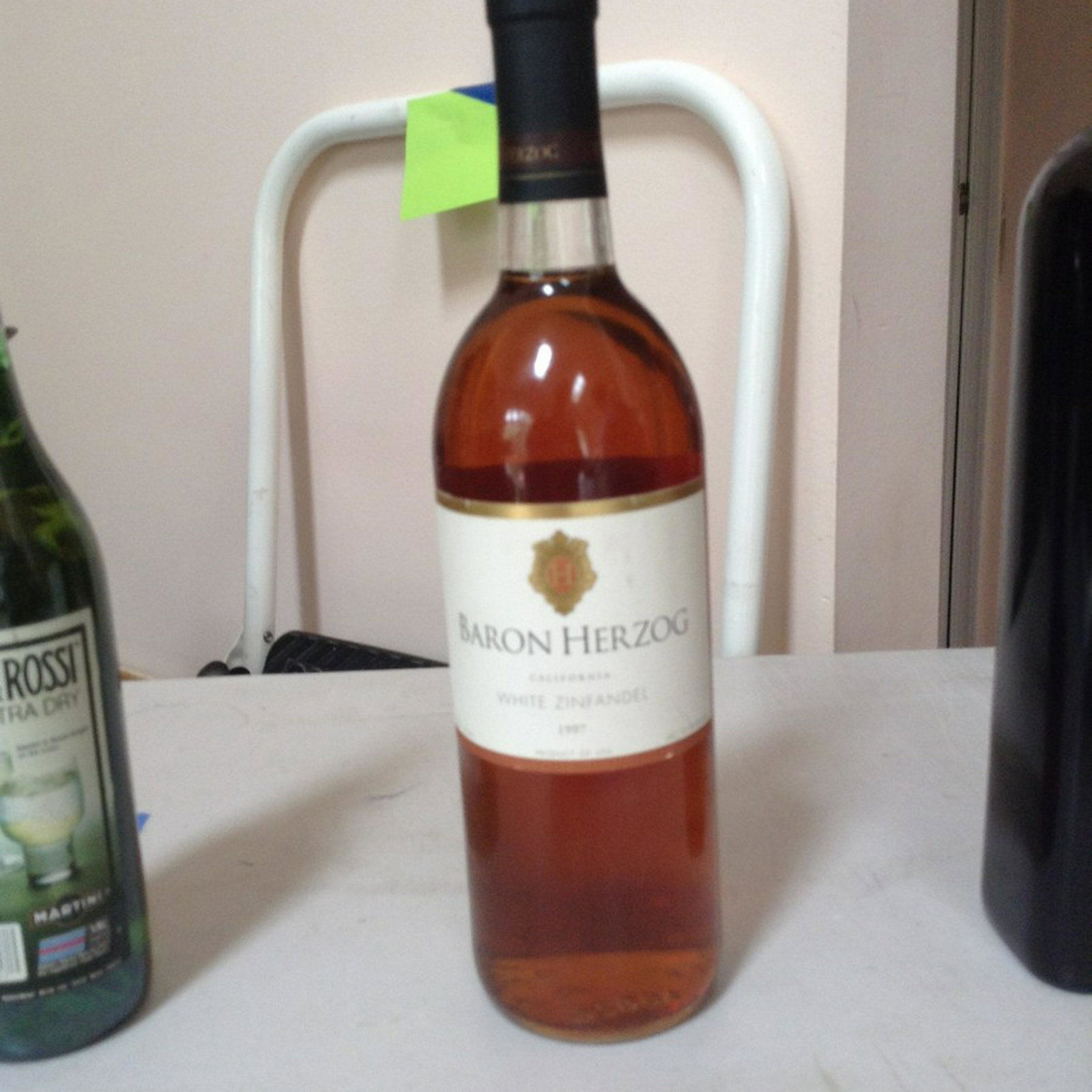 1997 Baron Herzog California white Zinfandel: Any contents in bottle is Free; You are bidding on the bottle & unbroken tax stamp