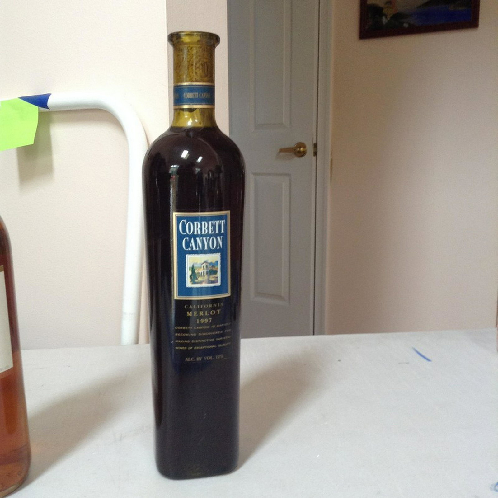 Corbett Canyon California Merlot 1997: Any contents in bottle is Free; You are bidding on the bottle & unbroken tax stamp