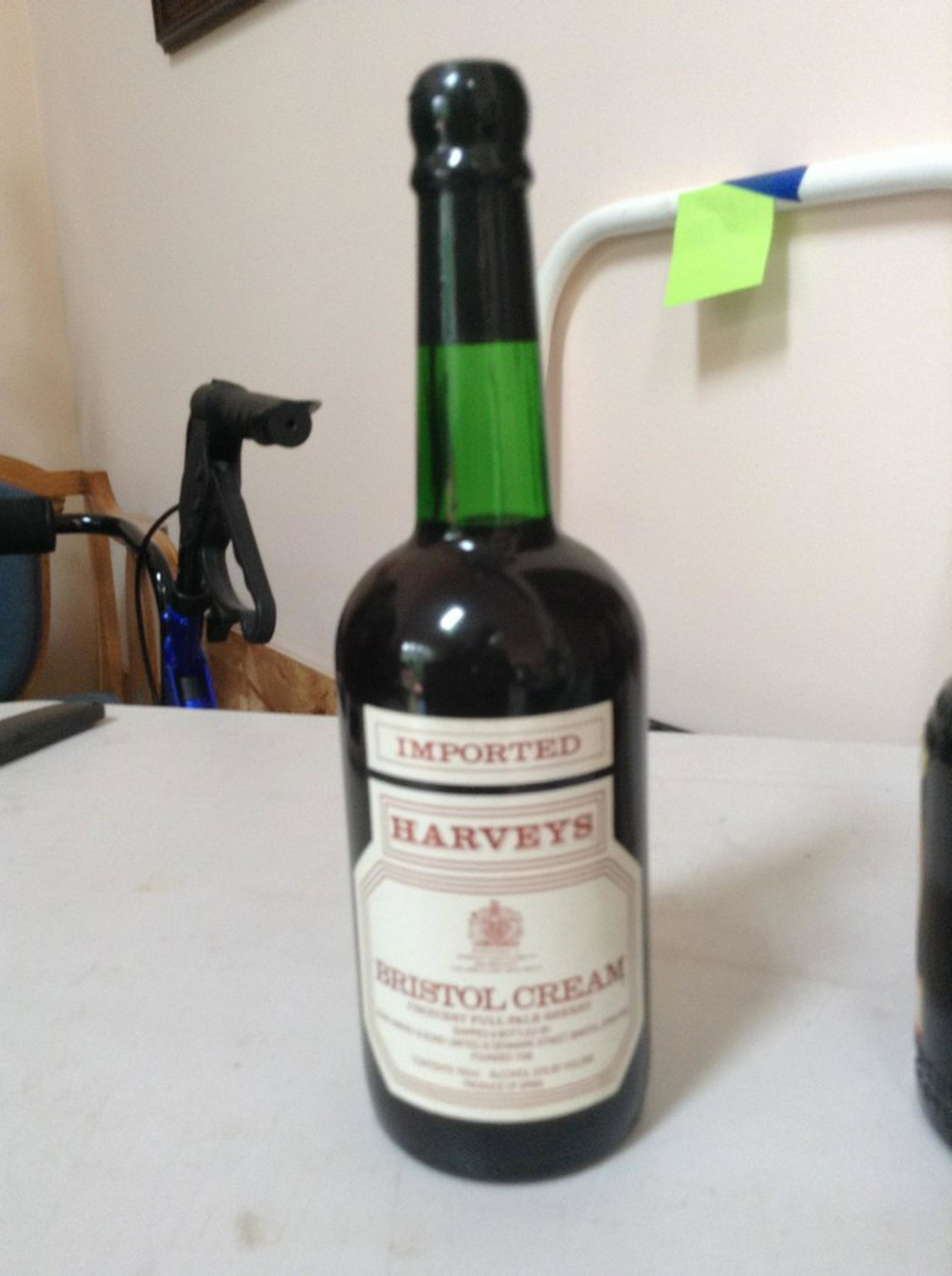 Harveys Bristol Cream: Any contents in bottle is Free; You are bidding on the bottle & unbroken tax stamp
