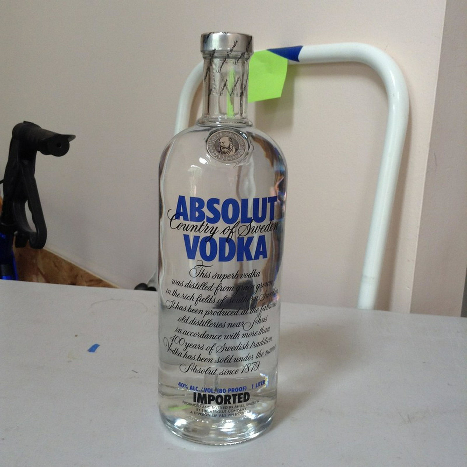 Absolut Country of Sweden Vodka imported 1879: Any contents in bottle is Free; You are bidding on the bottle & unbroken tax stamp