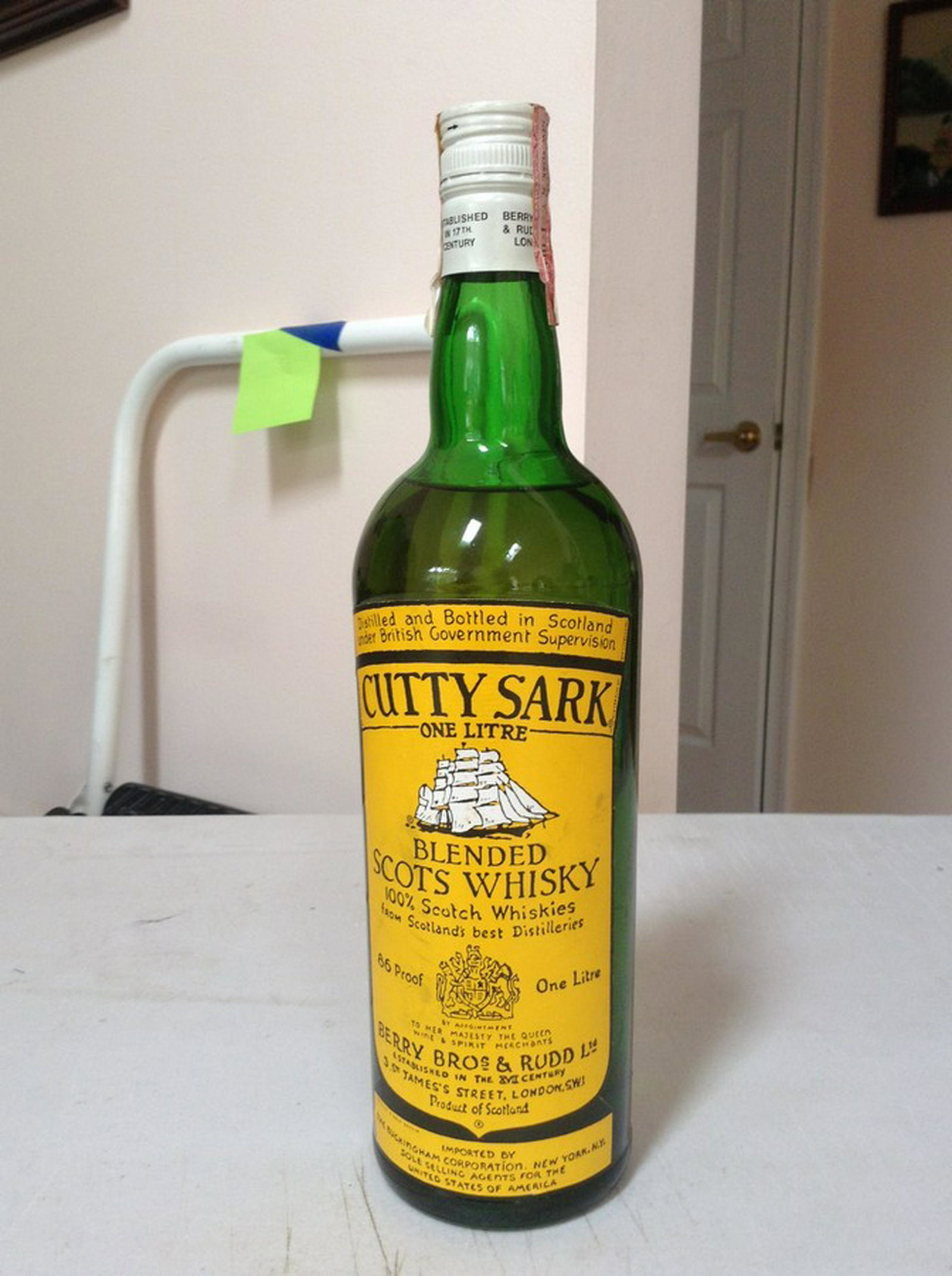 Cutty Sark Blended Scots whiskey Berry Bros and Ruud: Any contents in bottle is Free; You are bidding on the bottle & unbroken tax stamp