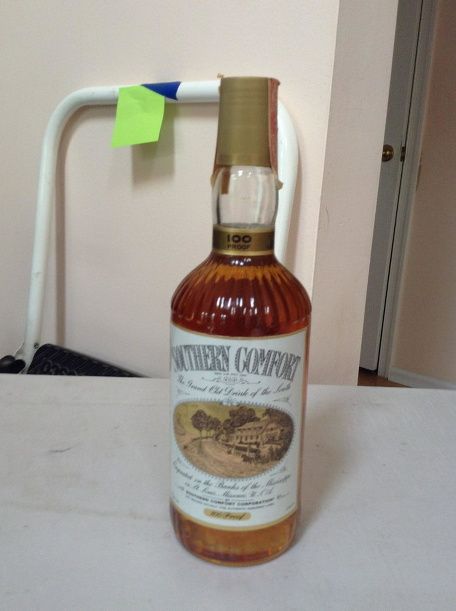 southern comfort 100 proof: Any contents in bottle is Free; You are bidding on the bottle & unbroken tax stamp