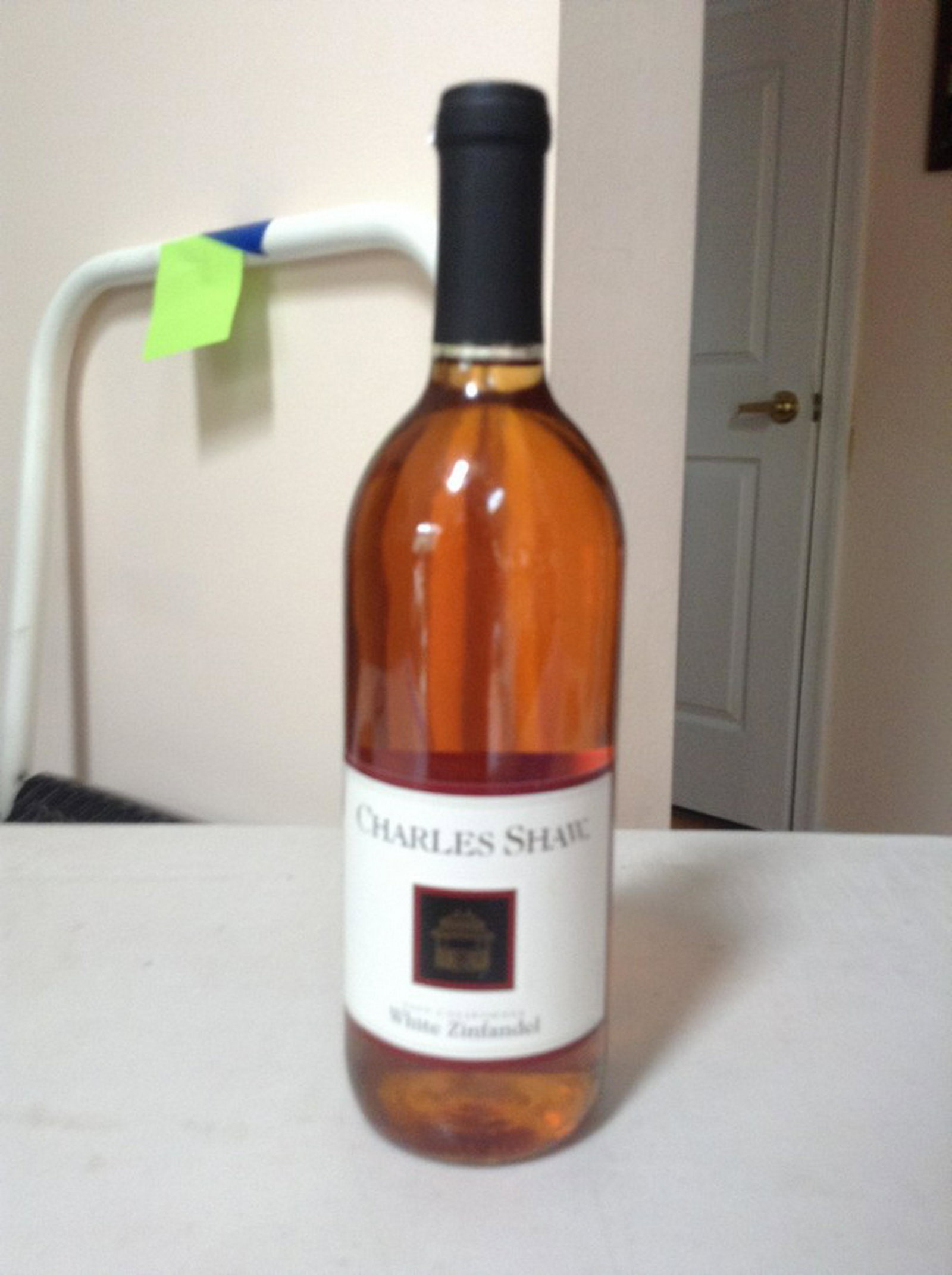 Charles Shaw 2009 California White Zinfandel: Any contents in bottle is Free; You are bidding on the bottle & unbroken tax stamp