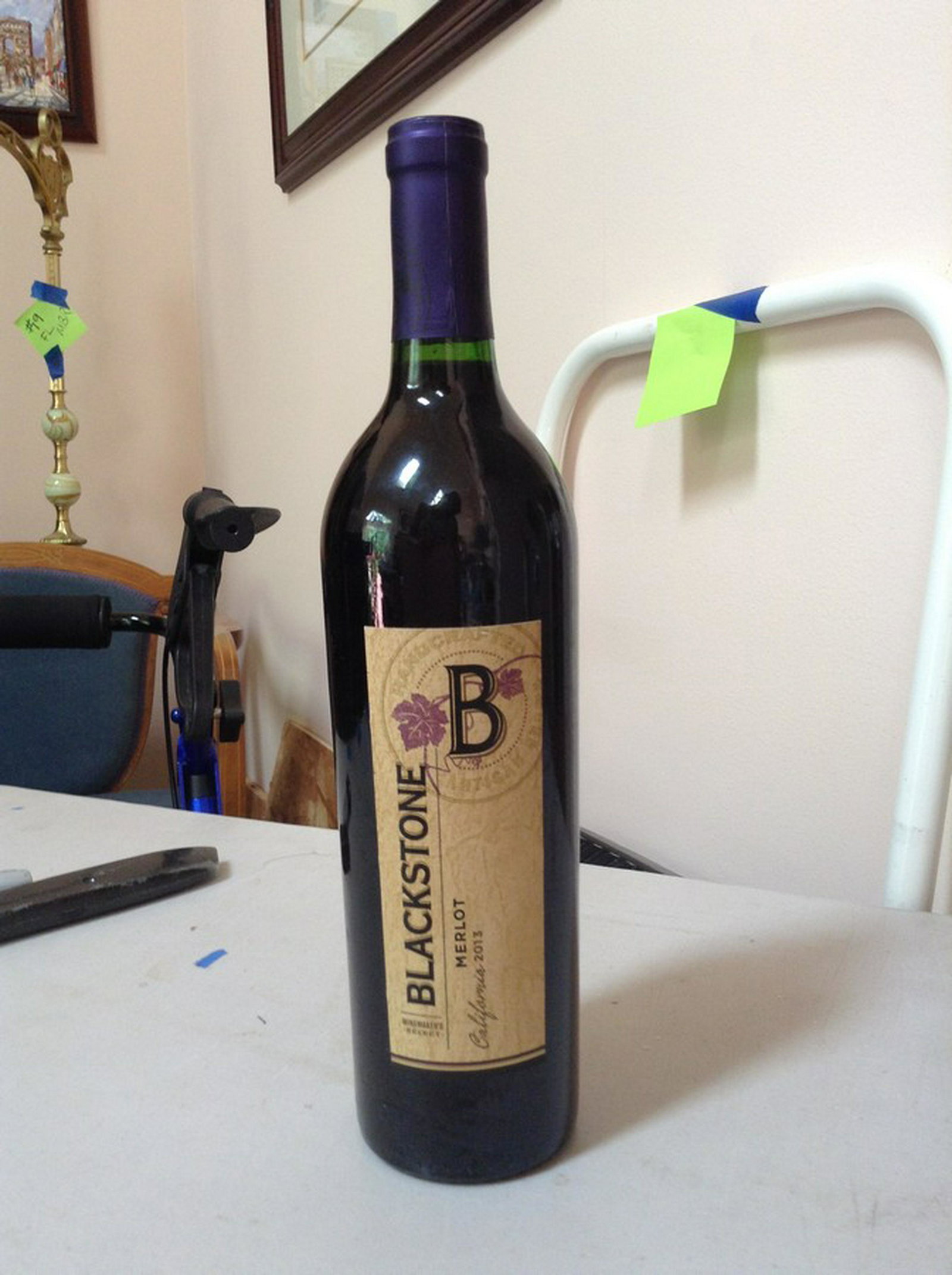 Blackstone Merlot California 2013: Any contents in bottle is Free; You are bidding on the bottle & unbroken tax stamp