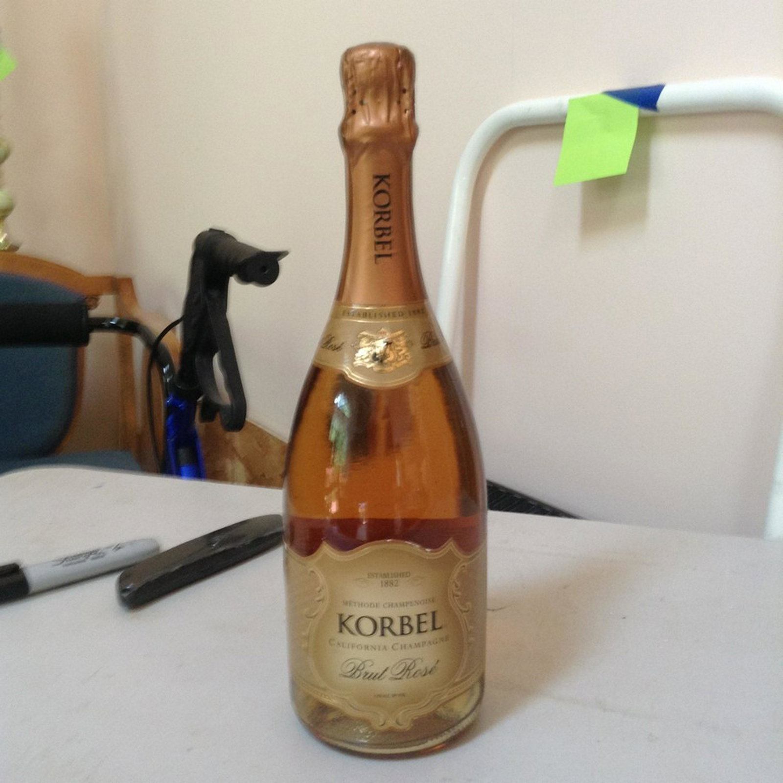 1882 Korbel California Champagne Brut Rose: Any contents in bottle is Free; You are bidding on the bottle & unbroken tax stamp