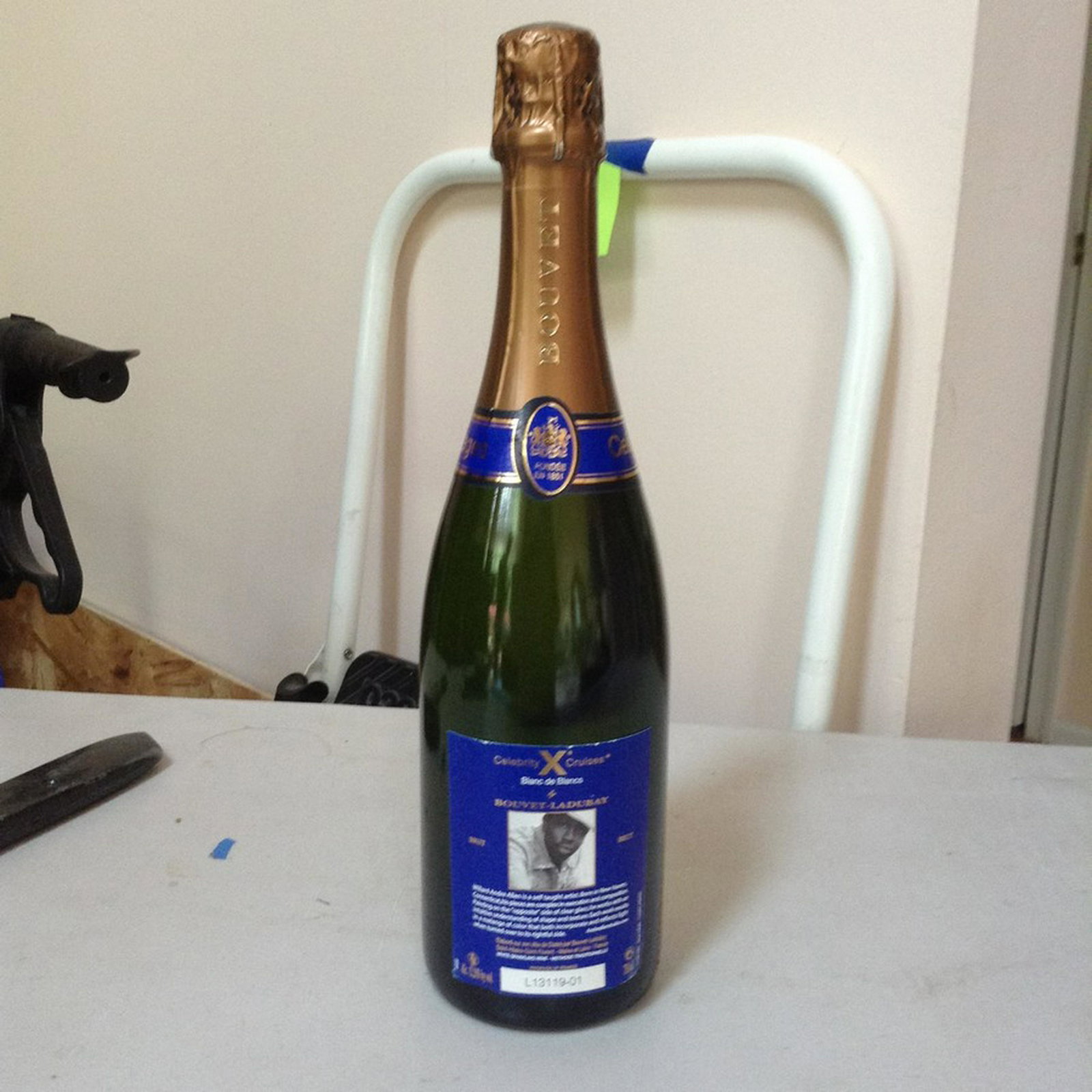 Celebrity Cruises Bouvet Laduary Blanc de Blancs Brut: Any contents in bottle is Free; You are bidding on the bottle & unbroken tax stamp
