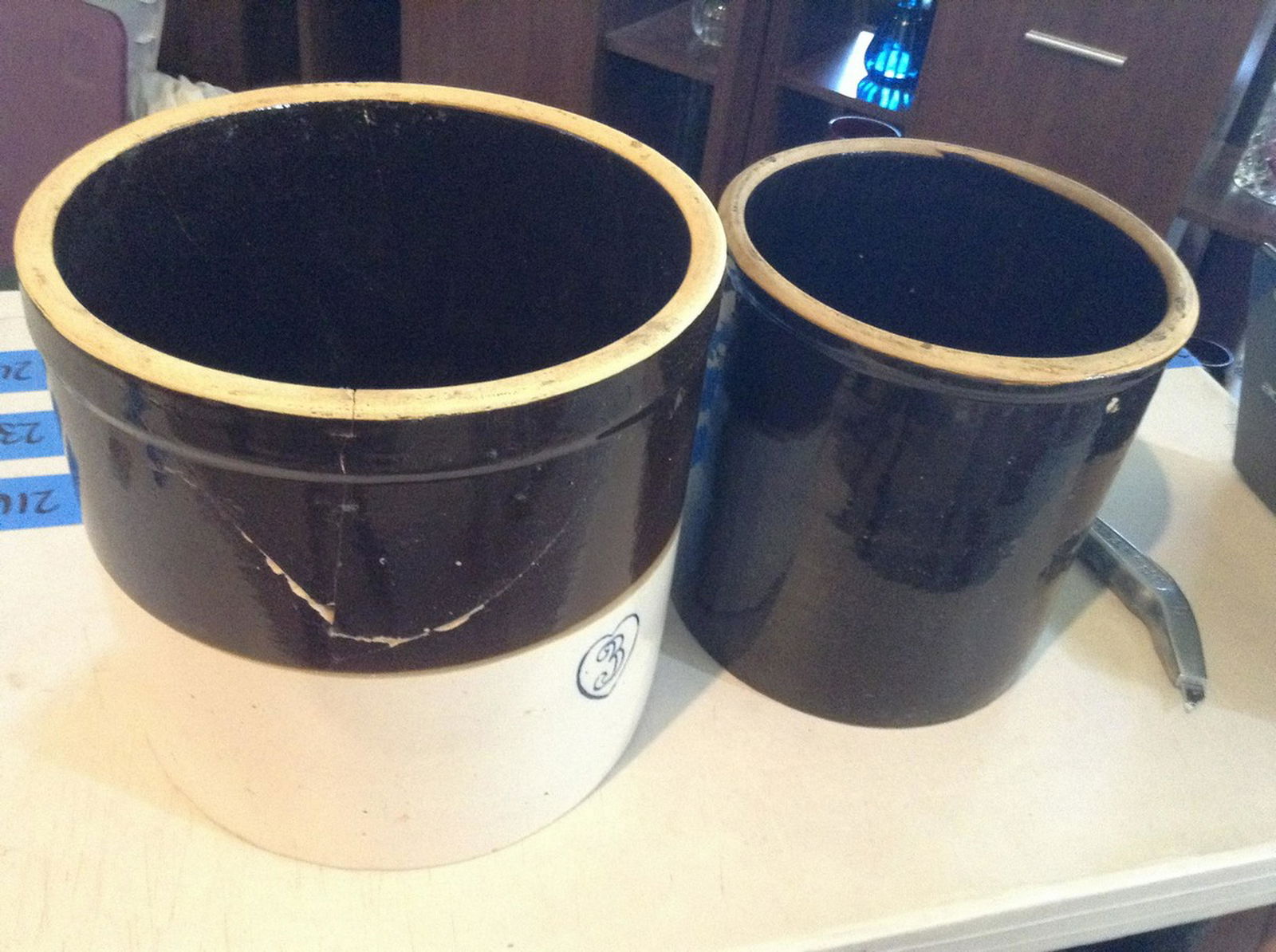 early crocks large one is cracked smaller one is good (1 of 1)