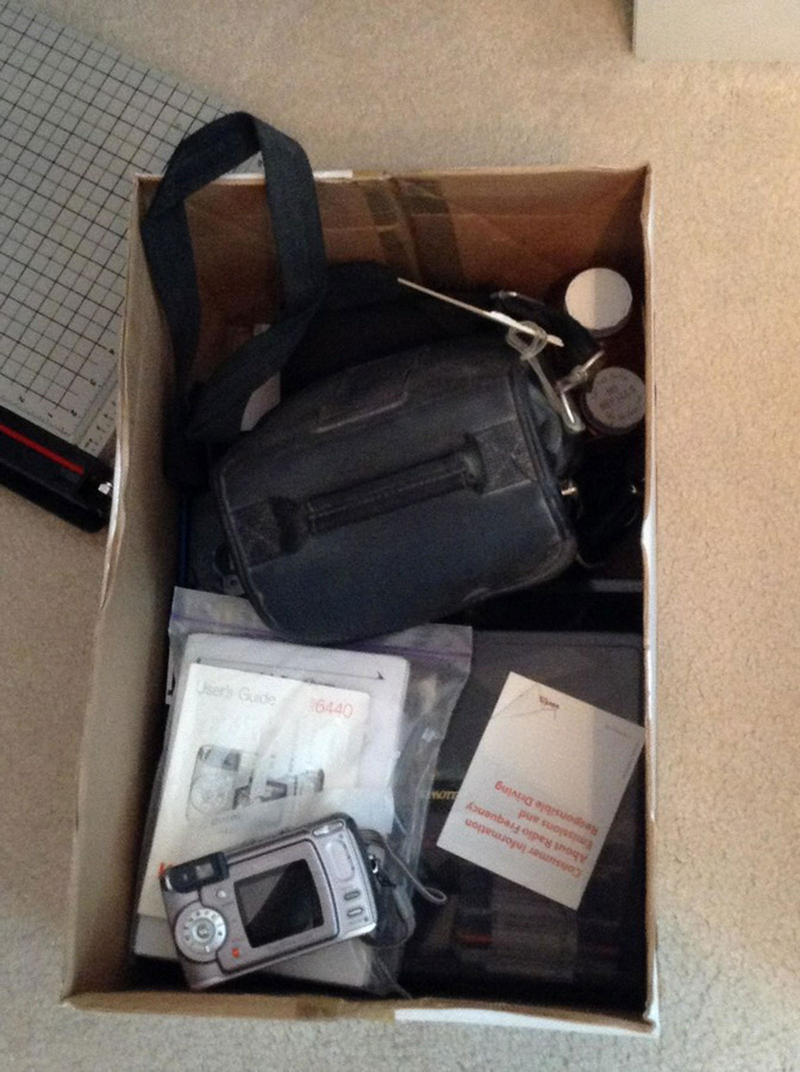 digital camera and box full of vintage computer (1 of 1)