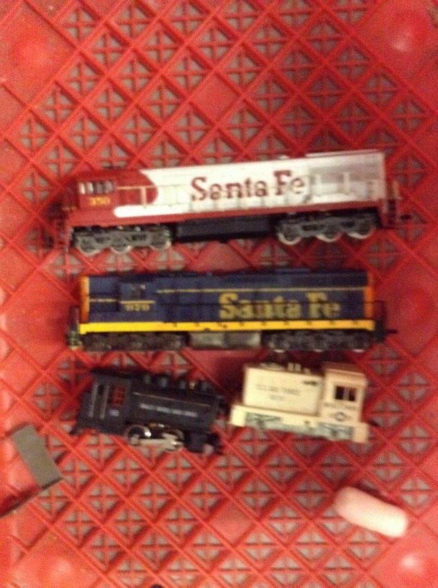 lot of four HO gauge train cars, some engines (1 of 1)