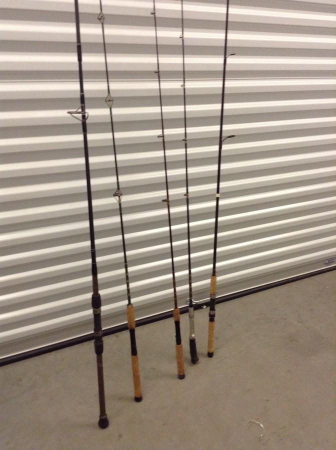 lot of 5 fishing rods: Lamiglas, Tsumami Trophy Series, Fenwick HMX, and two fishing poles aren't marked