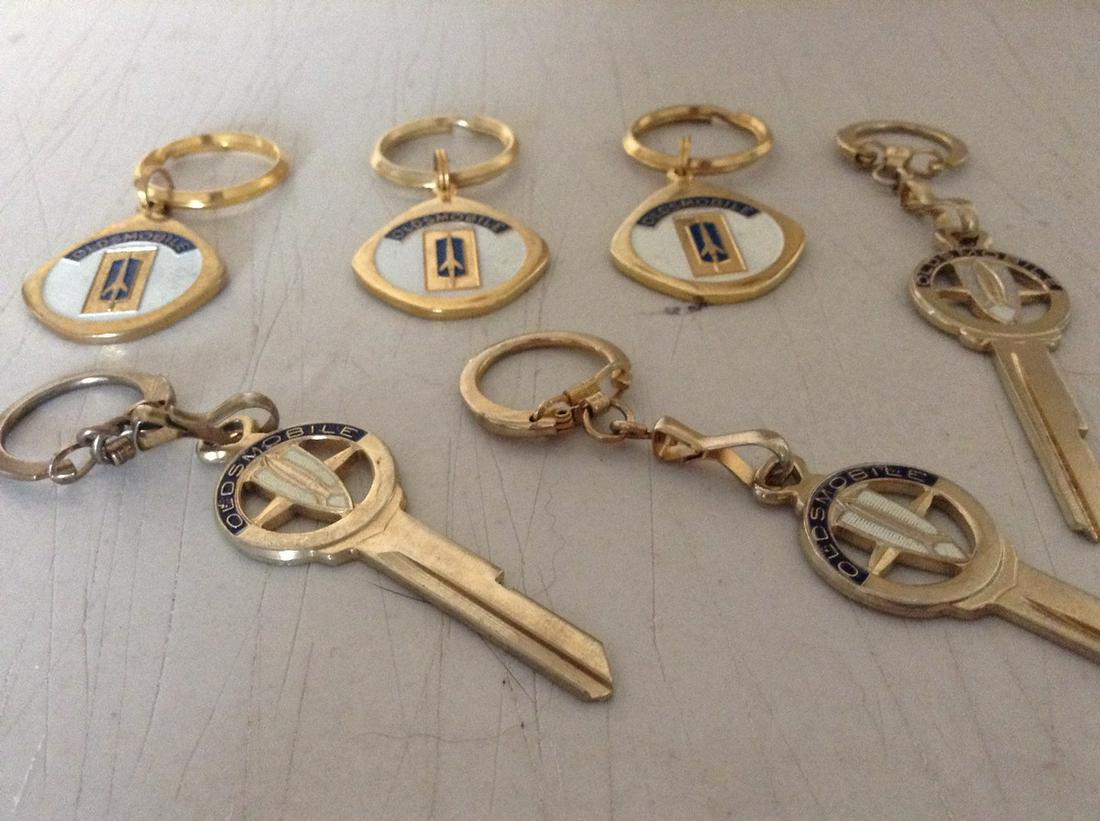 1960's Oldsmobile keychains: only given out by the dealer when purchased a new car