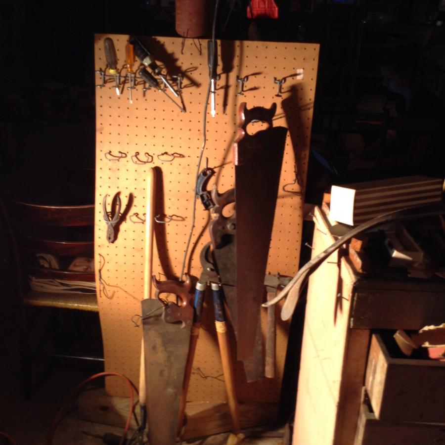 peg board loaded with tools: peg board loaded with tools