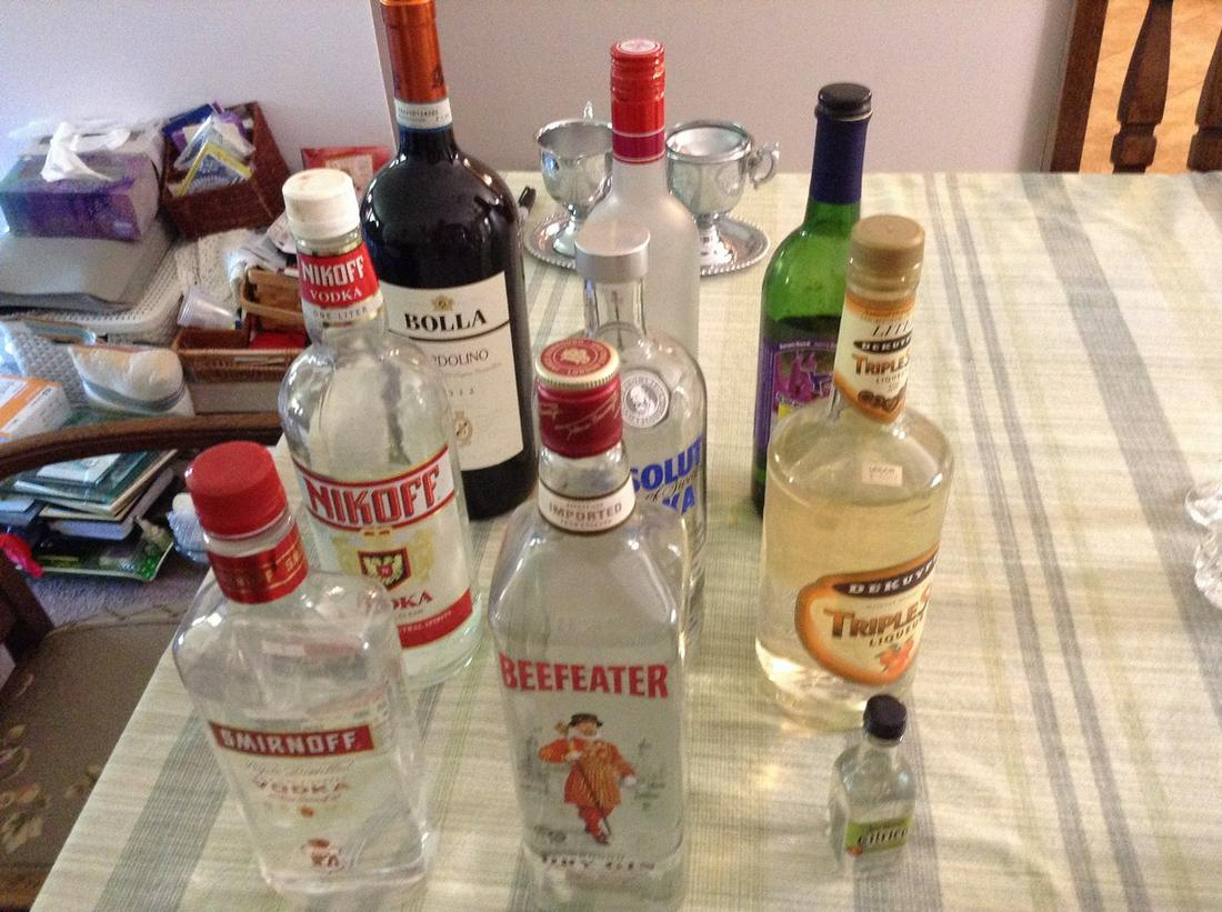 Lot of open bottles of liquor: Lot of open bottles of liquor