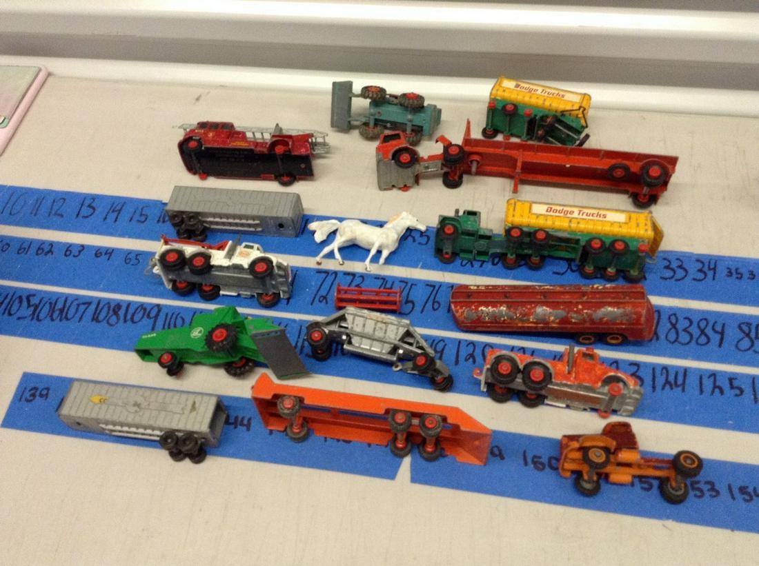 lot of LESNEY MATCHBOX trucks and farm accessories: lot of diecast metal trucks and farm accessories