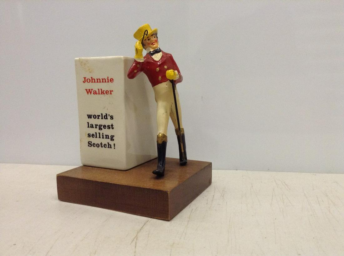 Johnnie Walker small bottle holder 8" high: Johnnie Walker small bottle holder 8" high