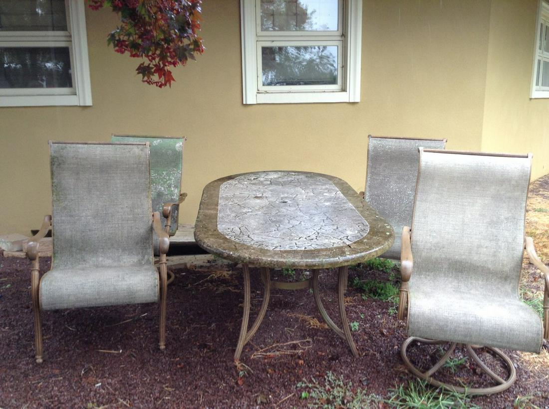 marble top table has damage with four chairs: marble top table has damage with four chairs