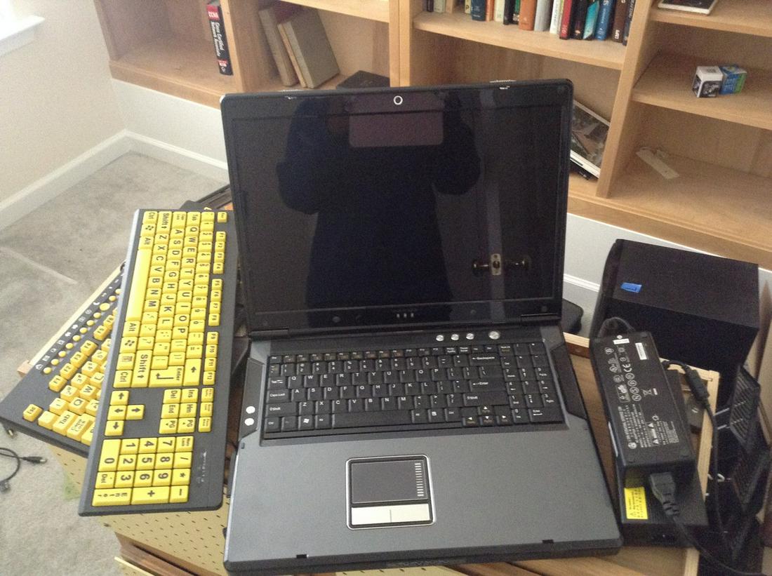 Notebook computer working with power cable and (1 of 1)