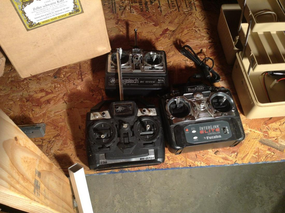 three remote control air plane controllers (1 of 1)