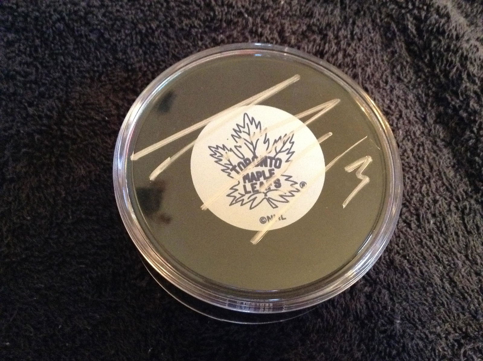 Toronto Maple Leaf's Dion Phaneuf signed hockey puck (1 of 1)