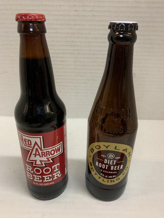 2 Soft drink Bottles /1 full and 1 empty, selling (1 of 1)