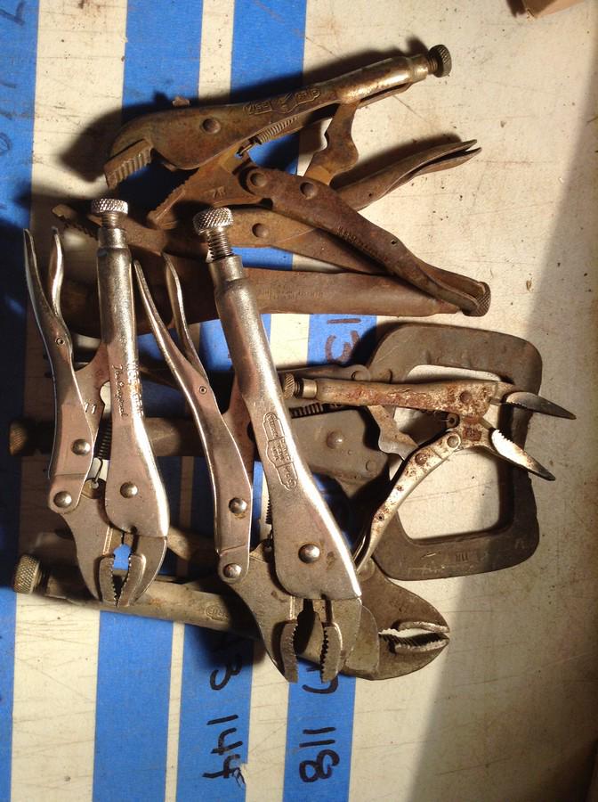 large amount of vise grips: large amount of vise grips