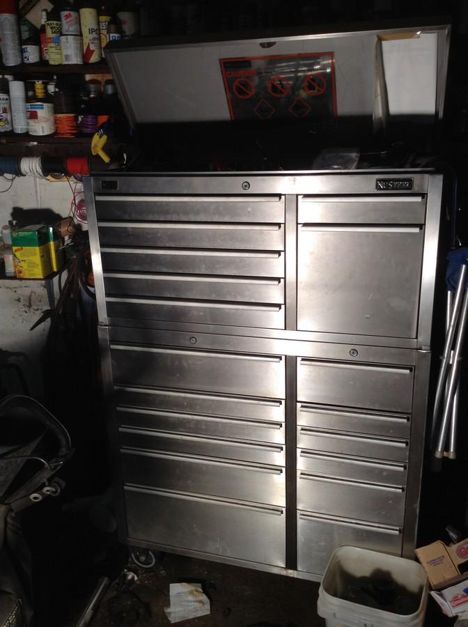 Nu Steel stainless steel tool box: top tool box 22" H X 41"; bottom tool 40"x41" no dings or dents, no contents together 63" tall