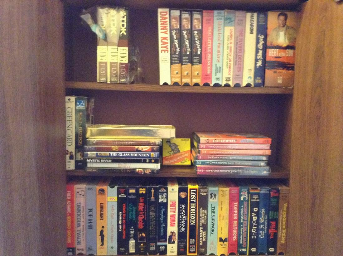 lot of DVDs and vhs tapes: lot of DVDs and vhs tapes