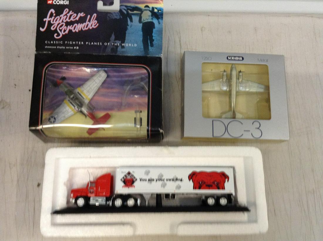 two model airplanes and diecast tanker truck: two model airplanes and diecast tanker truck