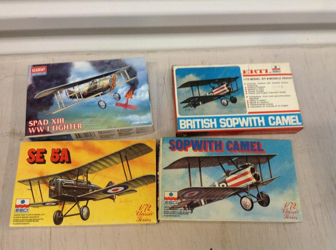 lot of four airplane mini models: lot of four airplane mini models