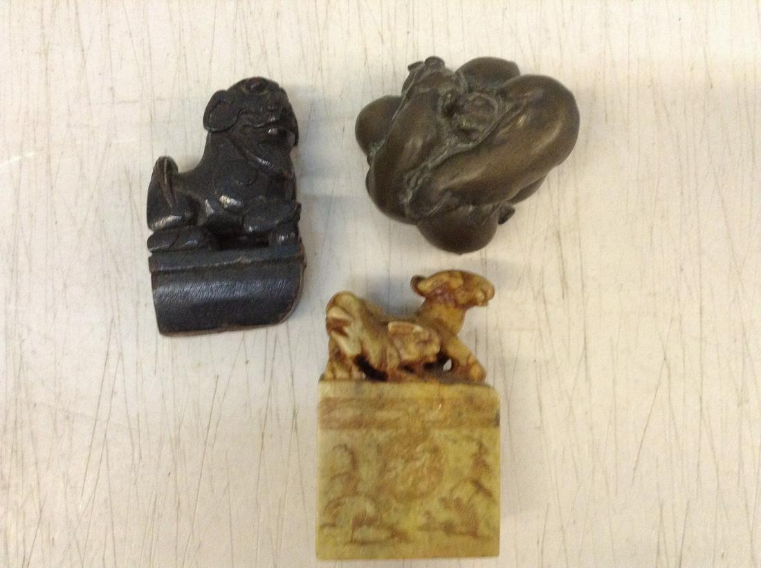 carved wood and stone statutes lot of three: carved wood and stone statutes lot of three