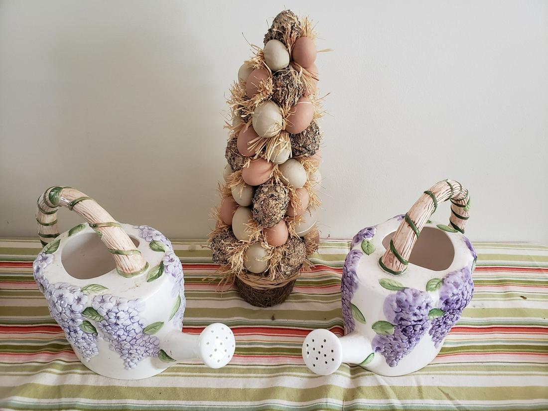 Matching porcelain watering cans and decorated tree: Matching porcelain watering cans and decorated tree