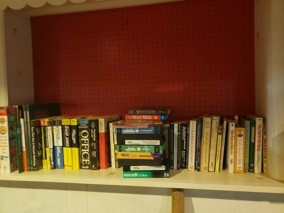 Large lot of books and VHS tapes: Large lot of books and VHS tapes